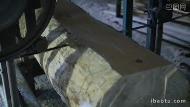 近景<strong>带</strong>锯在锯木厂将原木锯成板，在车间自动线锯木材